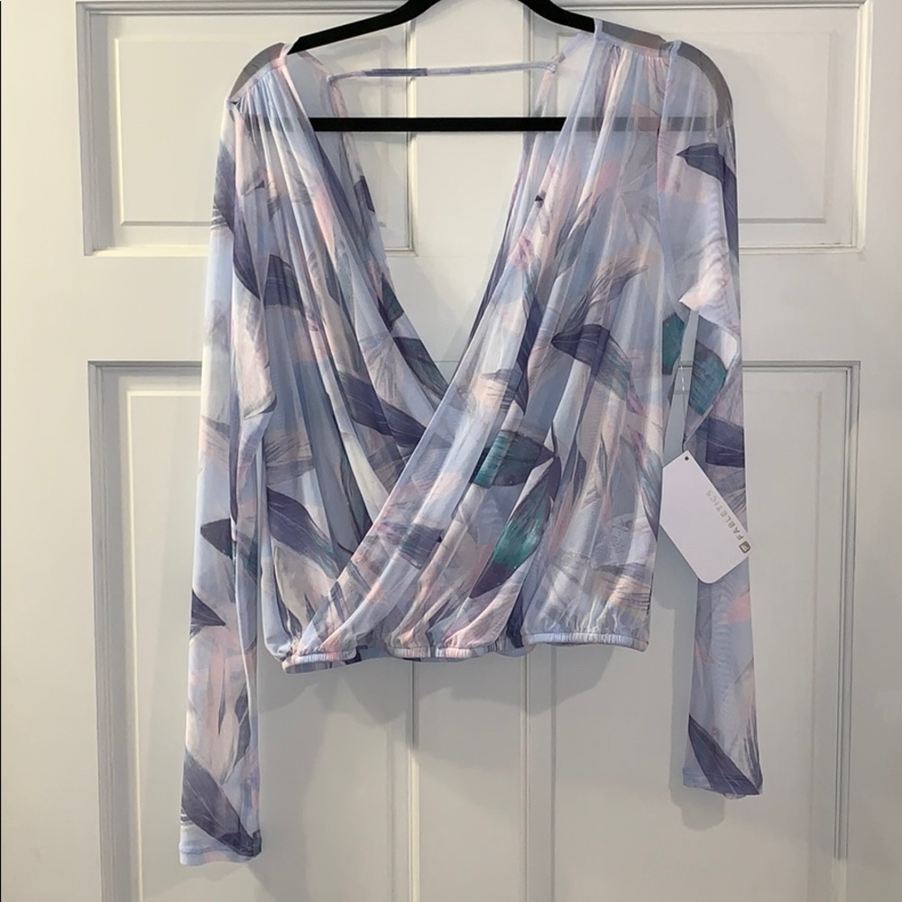 Fabletics “Treva” top. NWT. Sheer low “V” athletic